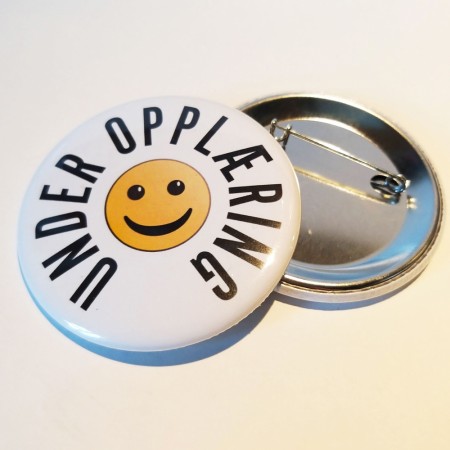 Under opplæring - 55 mm button